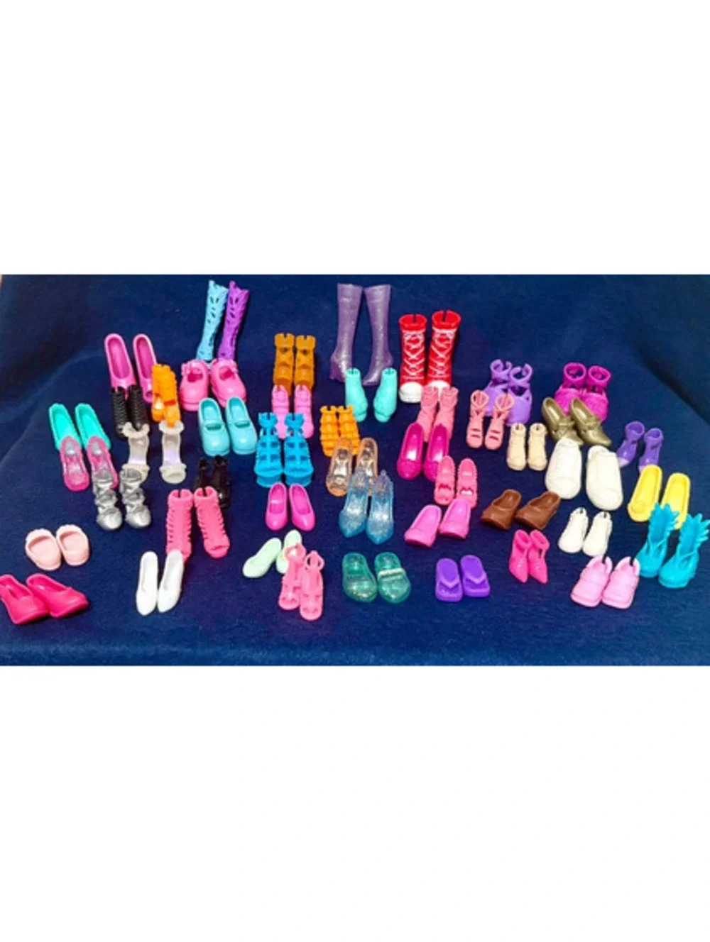 46 Matching pair of small dolls, Barbies, and Ken shoes